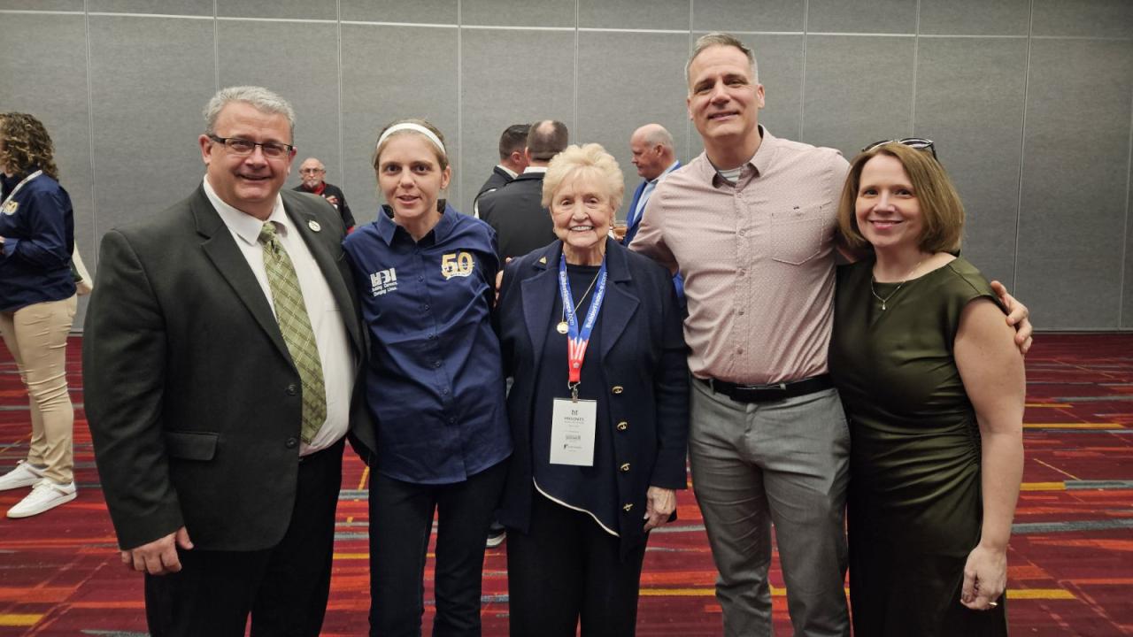 Amanda Snyder is joined by Dean Jeff Stevens, Dr. Mauro, and Vice President Carrie Cokely at the awards ceremony for the Shirley McVay Wiseman Award.