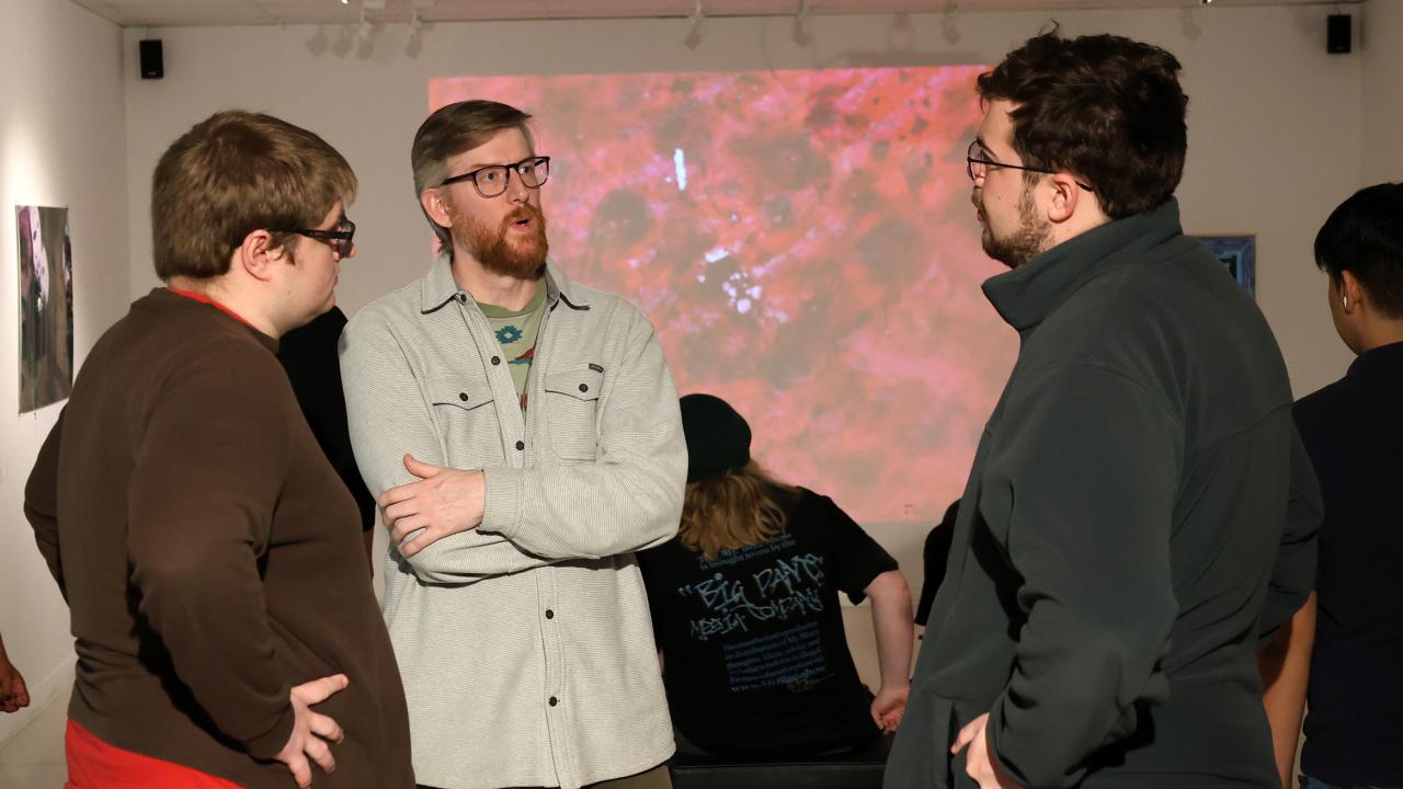Blake Barit speaks with students