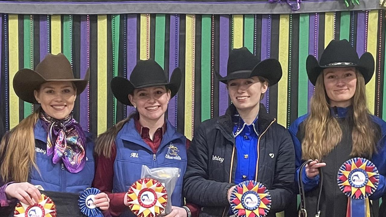 Western equestrian team with awards