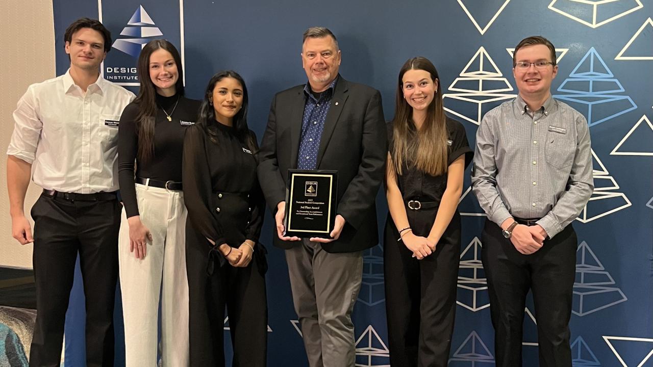 students display their 3rd place award